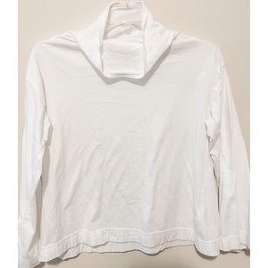 Free People white turtleneck with fun flare sleeves